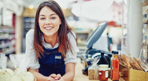 Small Business Saturday female shop owner smiling